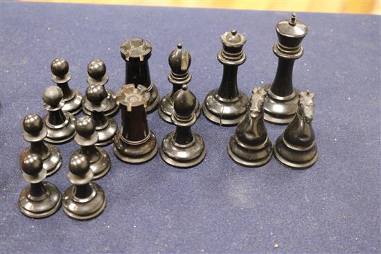 A Jaques Staunton boxwood and ebony chess set, knights and rooks stamped with a crown and the white king kings 8.5cm